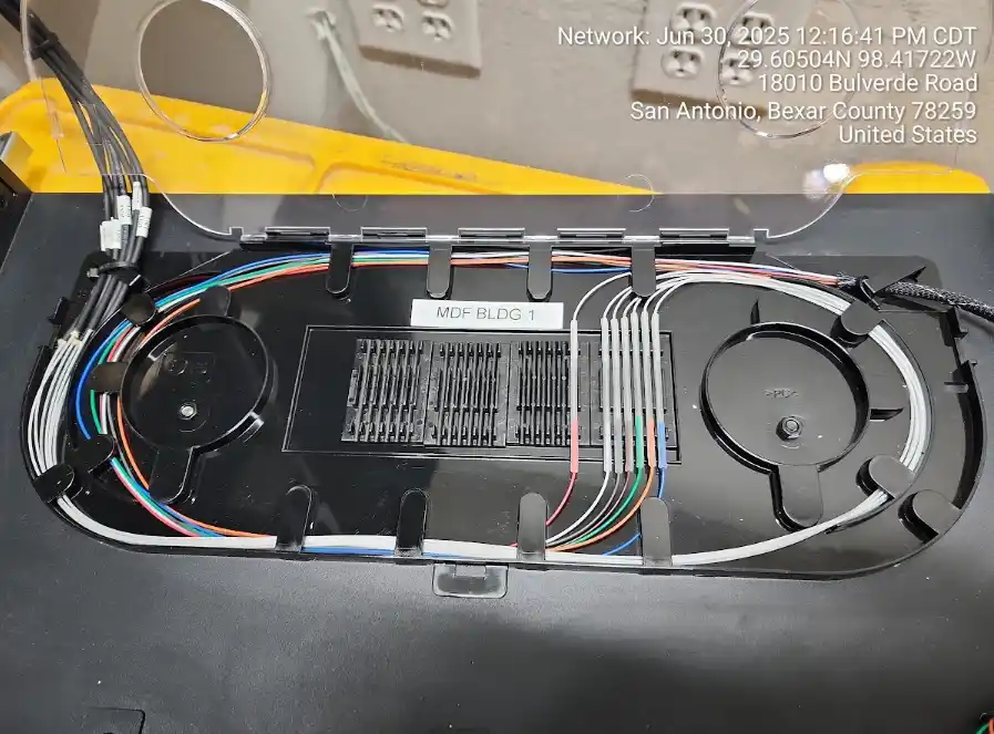 Fiber optic cable tray in a San Antonio school server closet