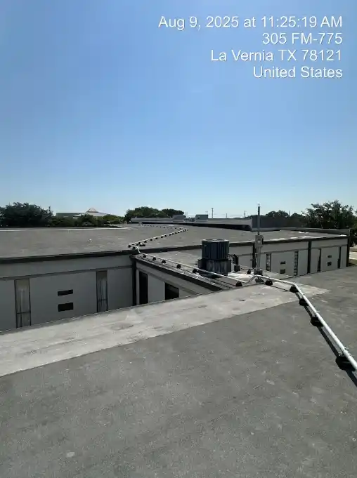 Fiber optic cable routed through EMT conduit pathway