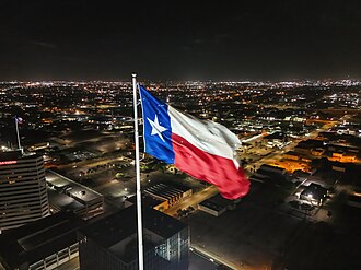 Texas flag flying above Corpus Christi, Texas