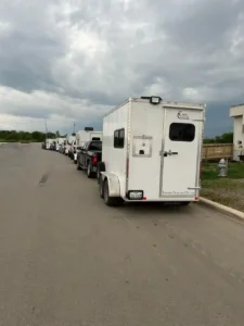 ASAP's 6 enclosed cargo and splicing trailers lined up and ready to mobilize