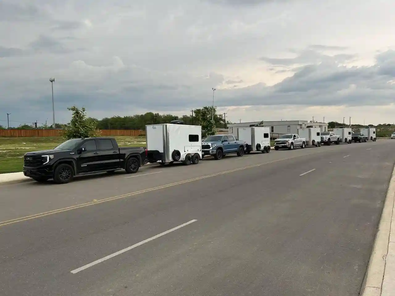 Trucks and enclosed trailers from the ASAP Computer Services fleet lined up for a San Antonio commercial technology and network relocation