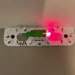 Fiber optic installation of MPOE in San Antonio Facility showing VFL Visual Fault Locator test that is passing, visible light test.